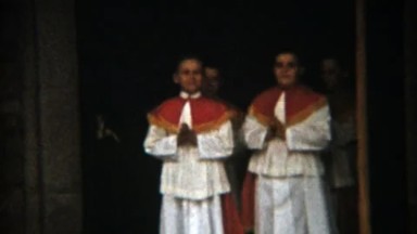 1957: Boys 1st communion Catholic religious parading celemony outdoor.