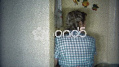 1953: Grandma Cleaning Dishes in Kitchen After Dinner Feast