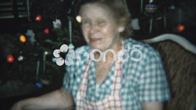 1954: Grandma Happy as a Clam at Christmas Tree Background