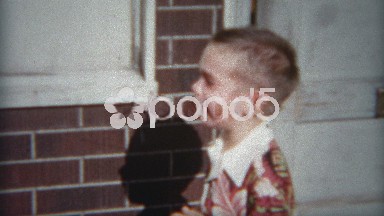 1954: Boy Crying in Vintage 1950s Hawaiian Print Button-Down Shirt