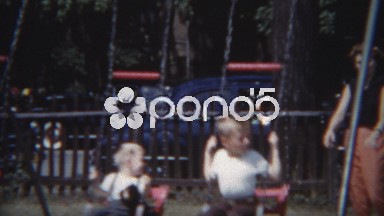 1954: 50's fashionable mom pushing boys on swing at public city park.