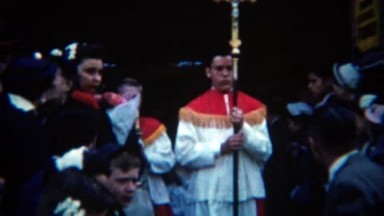1952: Catholic boys 1st communion ritual outdoor community walk.