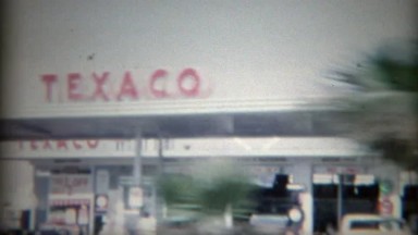 1965: Vintage Texaco Gas Station and Landmark Hotel Casino Tower, Las Vegas