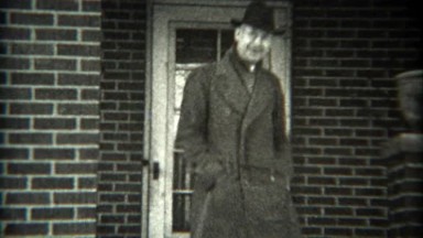 1936: Man Backing 1934 Ford Out of Driveway in Saxton, Pennsylvania
