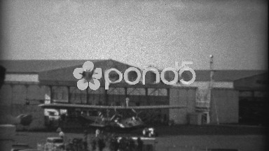 1935: Pan American Airways System airplane warehouse hangars. MIAMI, FLORIDA
