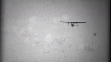 1935: Pan Am Sikorsky S-40 sesquiplane amphibious flying boat landing to crowd.