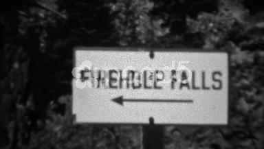 1937: Firehole Falls Roaring River Water Tilt Down to Fast Flowing Waterfall.