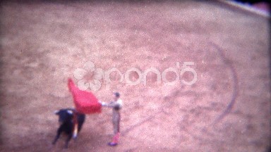 1956: Red Matador Fights Charging Bull in Center Rink as Dance Continues