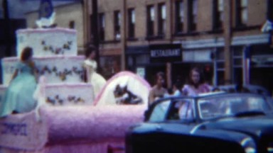 1951: Chamber of Commerce parade float women long dresses. ERIE, PENNSYLVANNIA