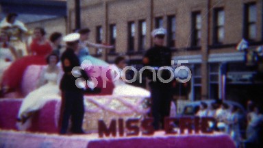 1951: Miss Erie parade float with pretty women in long 1950s fashion dresses