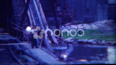 1949: Lumber Mill Feeding Logs Into the Conveyor Belt Milling Factory