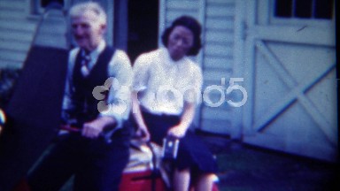 1949: Old man sits with Asian girlfriend and drives off old lady wife. ERIE,