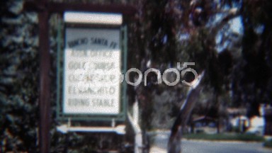 1949: Rancho Santa Fe city tour area buildings southern california style. RANCHO