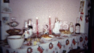 1962: Holiday party table filled with self serve desserts and liquor bottles.
