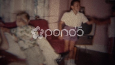 1962: Family Play Fighting and Laughing in Living Room, Buffalo, New York