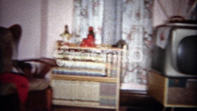 1963: Vintage 8mm Home Movie of 1960s Living Room with TV, Couch, and Chair