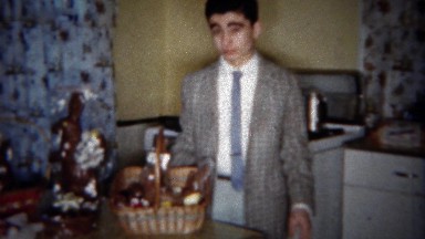 1963: Siblings Easter baskets with chocolate bunny rabbits. BUFFALO, NEW YORK