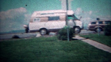 1972: Rest stop road trip conversion van interstate highway travel. MADISON,