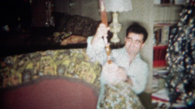 1966: Man gets wooden archery recurve bow and arrows for Christmas gift.