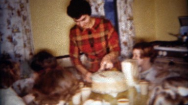 1962: Mother serving birthday cake little girls party. BUFFALO, NEW YORK