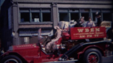 1964: WBEN evening news truck at parade. BUFFALO, NEW YORK