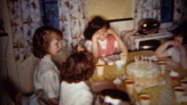 1962: Little girl birthday party cake served around kitchen table BUFFALO, NEW