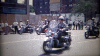1962: Police motorcycle group parade through downtown city. BUFFALO, NEW YORK