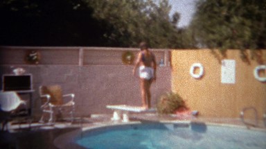 1967: Children Diving Backwards Into Personal Swimming Pool, San Diego