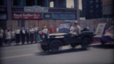 1962: Army Jeep Pulling Religious Parade Float in Buffalo, New York