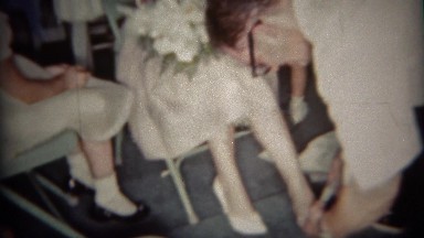 1965: Shy Faceless Women Participate in Garter Toss at Wedding Reception, Buffalo, New York