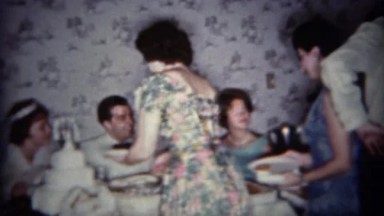 1965: Wedding reception food served at newlyweds table. BUFFALO, NEW YORK