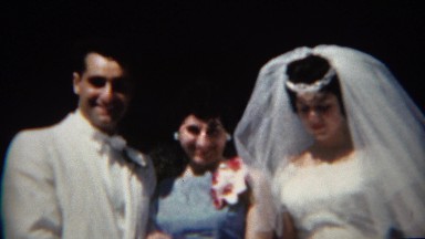 1965: Cute Italian newlyweds pose with bossy sister. BUFFALO, NEW YORK