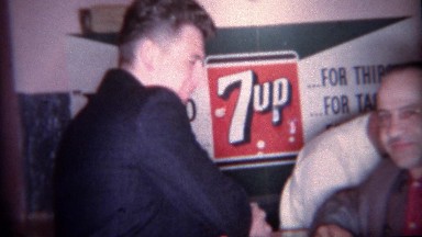 1966: Men drinking 7up soda at dry social event. BUFFALO, NEW YORK