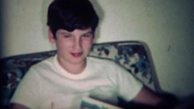 1970: Kid Reading Mad Magazine Patton Movie Spoof Edition in Boulder, Colorado