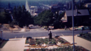 1959: View from city hall of the growing city below and mountains. SALT LAKE
