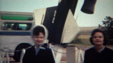 1966: Women Walking Past Tour Bus Visiting the Museum at U.S. Air Force Academy