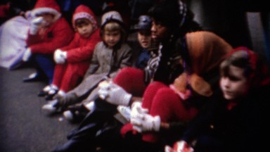 1967: African American teenager embarrassed around small children. CHICAGO,