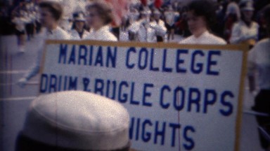 1967: Marian College drum bugle corps marching band parade. CHICAGO, ILLINOIS