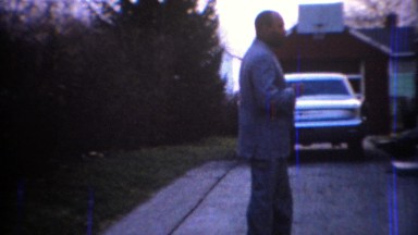 1967: African American man dressed in formal gray sports suit. CARMEL, INDIANA