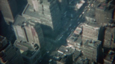 1968: Atop a skyscraper looking down to the car street traffic below. NEW YORK
