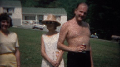1968: Family enjoying summer sunshine drinking cans of soda pop. TAMPA, FLORIDA