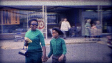 1971: African Mother and Daughter Leave Grocery Store with 10-Cent Bananas