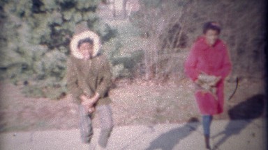 1971: African Sisters Find Puppy in Winter Coats