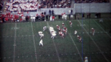 1971: College football game passing touchdown score.