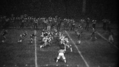 1978: High school football night game receiver diving catch fail.