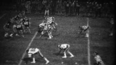 1978: High School Football Night Game Quarterback Throws Interception Pass.