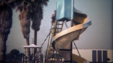 1979: Father Goes Solo Down Twisting Playground Public Park Slide.