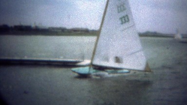 1979: Sailboat high speed harbor pier docking during windy conditions.