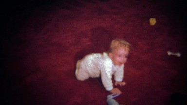 1979: Seemingly happy baby cries for no obvious reason.