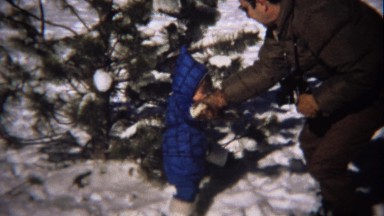 1974: Young Girl in Blue Coat Winter Snow Dad Helping